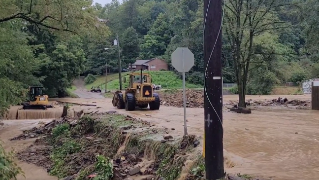Extension of Flood Warning for Certain Counties; Evaluation of Damage Set for Tuesday in Kanawha